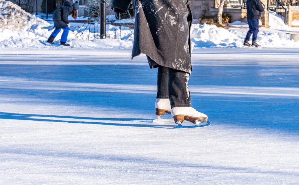 a person on a skateboard on a frozen lake