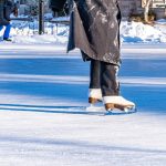 a person on a skateboard on a frozen lake